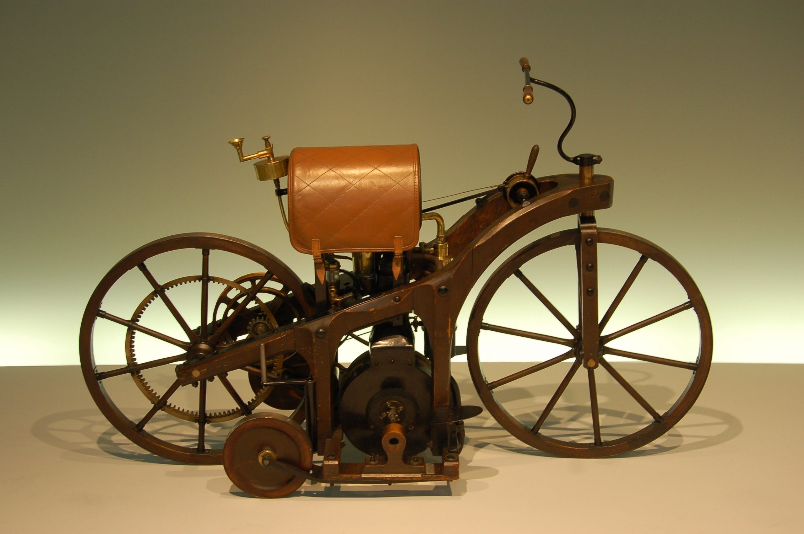 1885 Reitwagen internal combustion motorcycle on display in exhibit